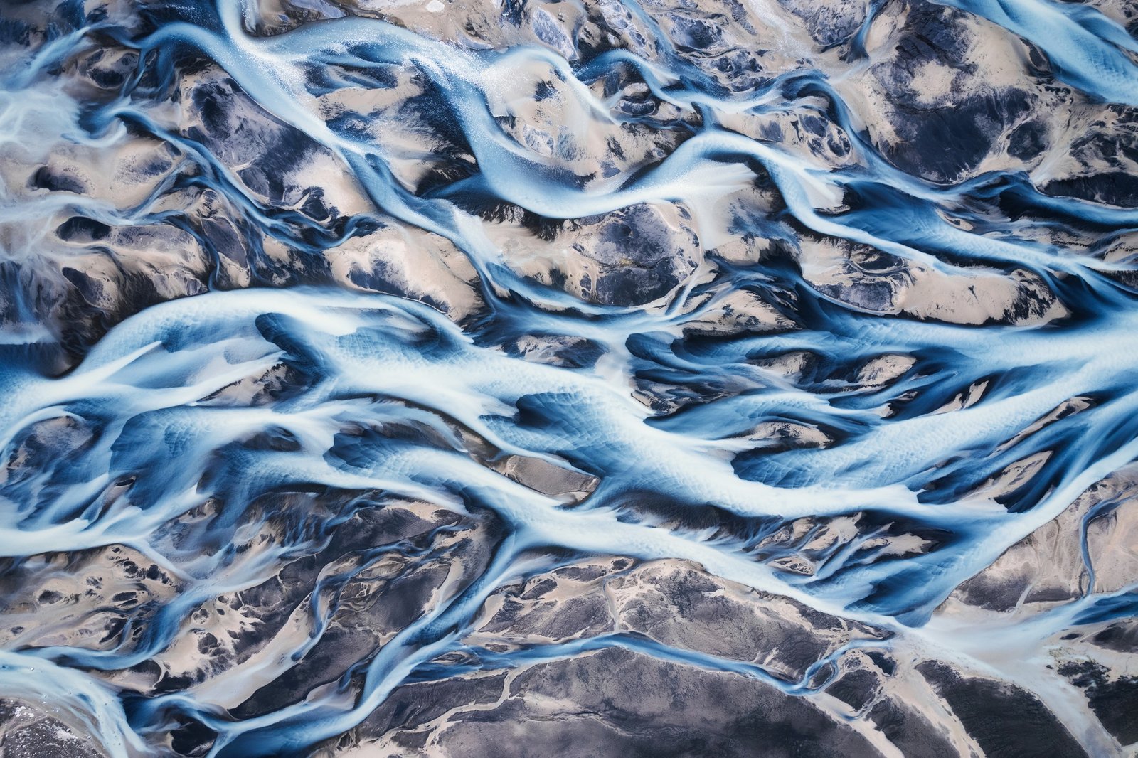 Abstract beautiful glacier rivers pattern on earth in highlands of Iceland