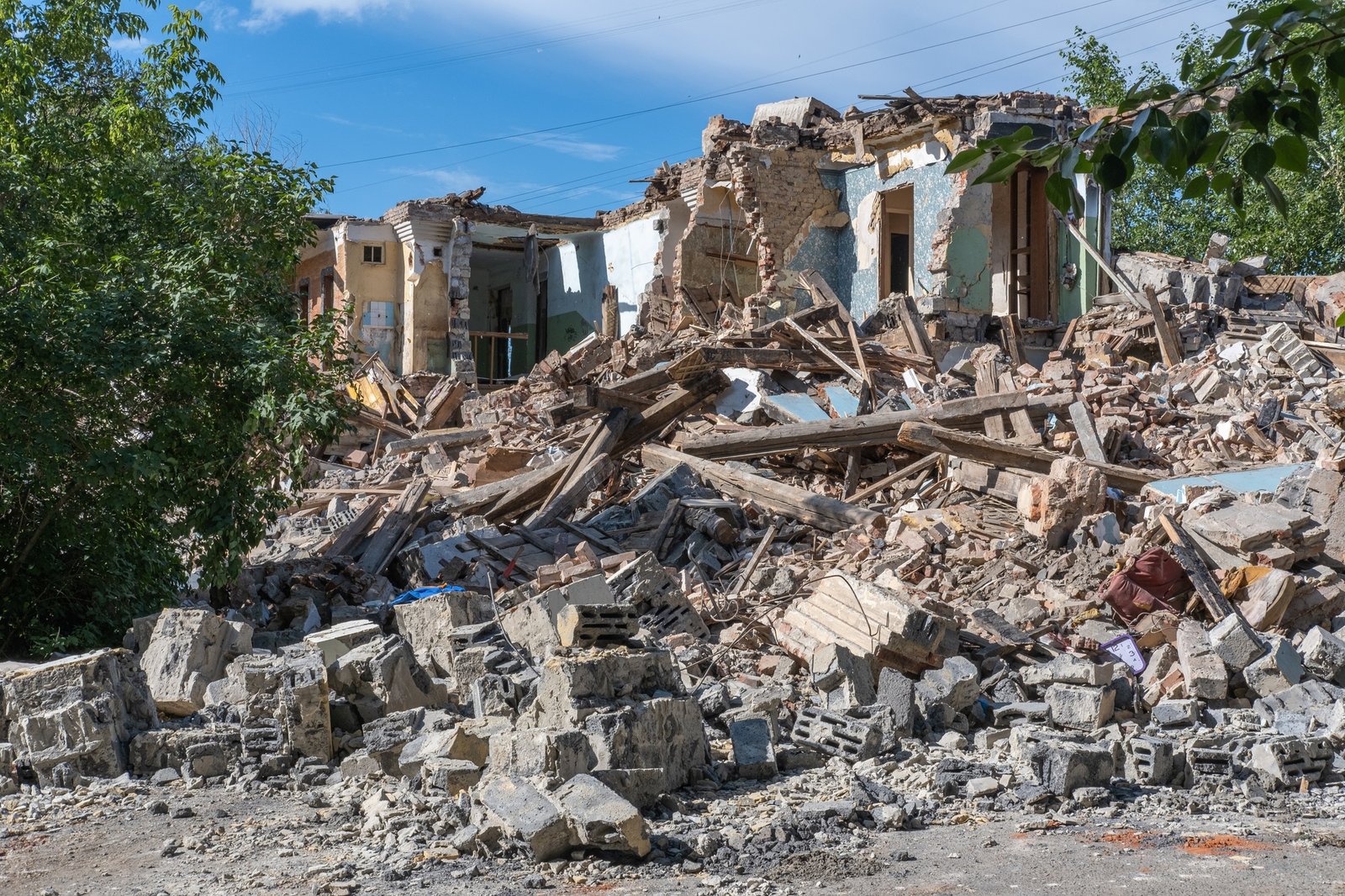 Landscape of ruined buildings, image of decrepitude or natural disaster. The house is destroyed.