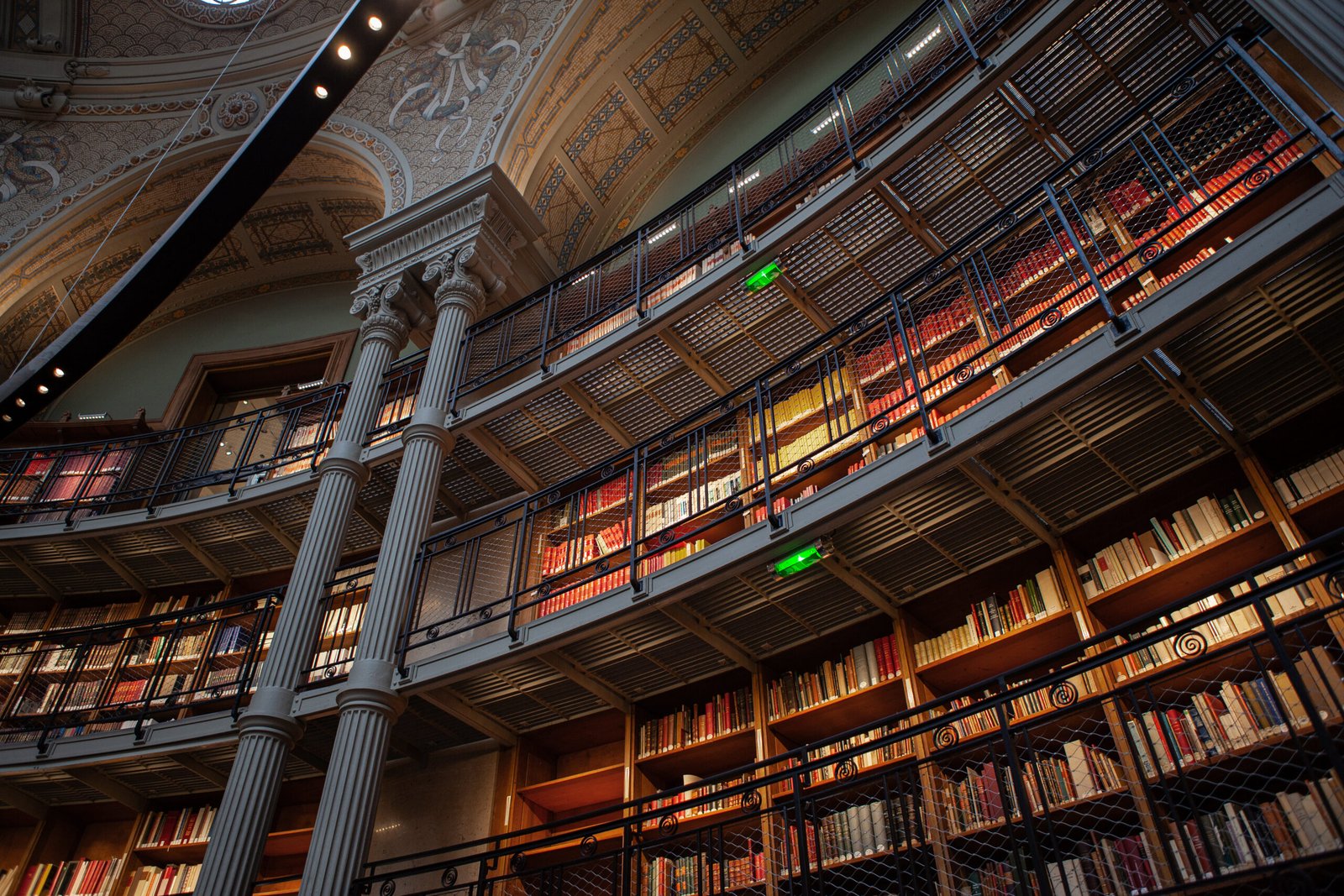 Tall bookshelves in a circular library hall